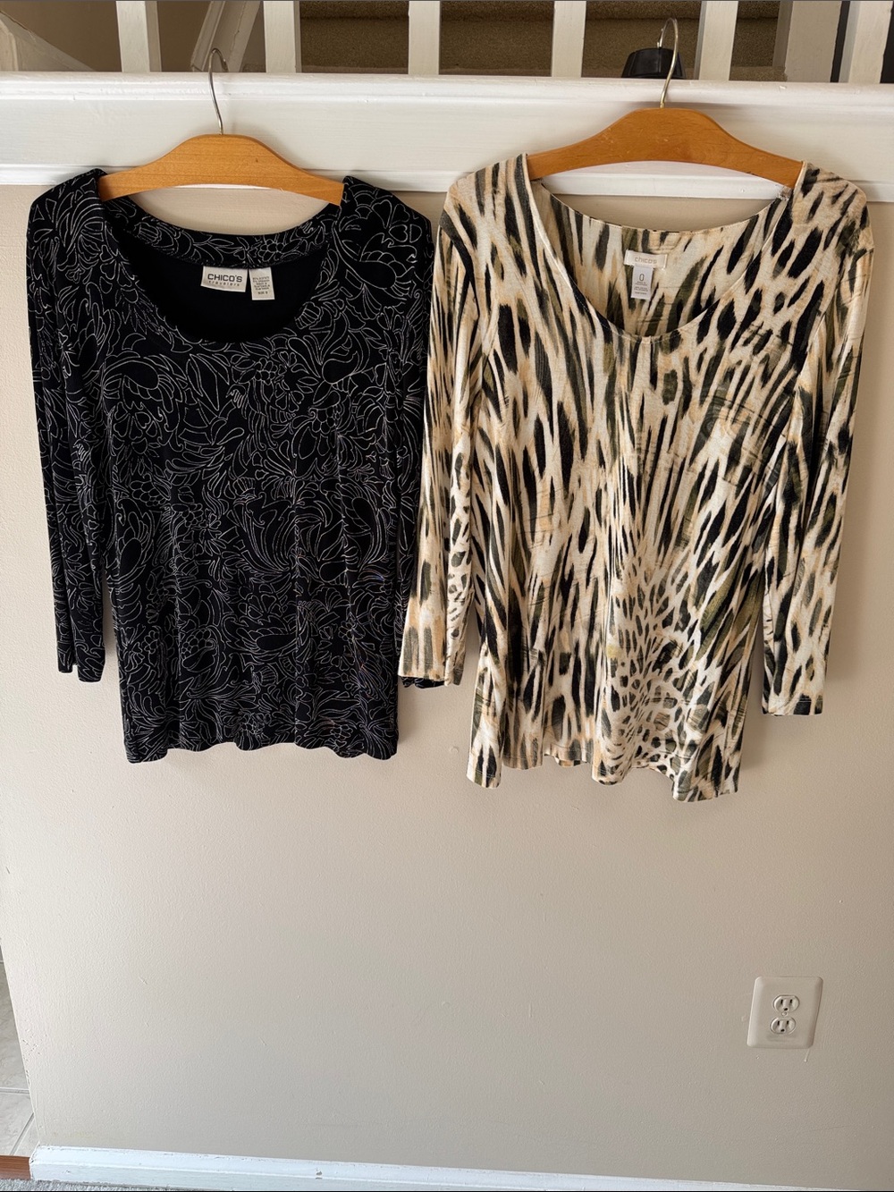 Bundle of two Chico's Black Floral and Cream Animal-Print blouses